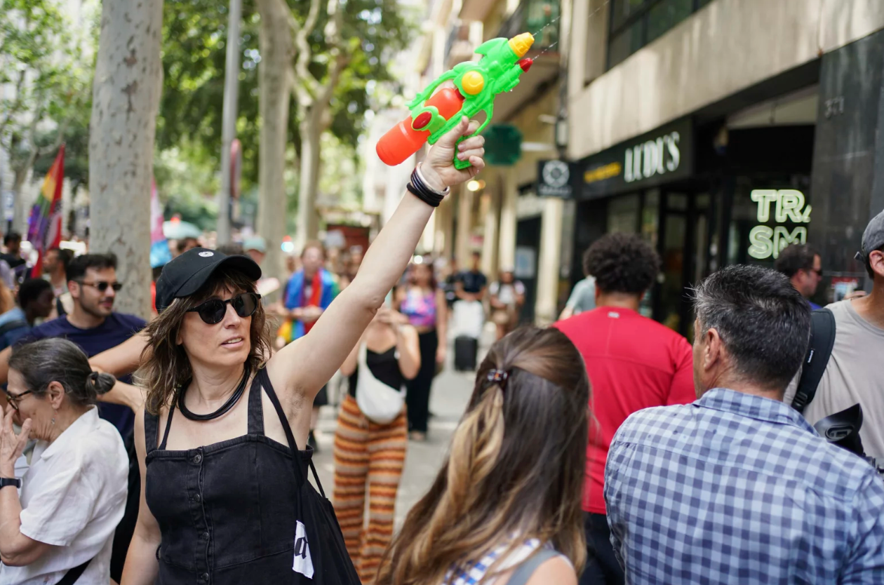 Locals in Spain Protest Overtourism—Spraying Tourists with Water Pistols
